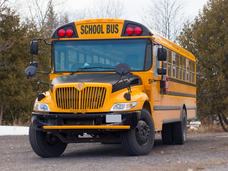 yellow school bus on road
