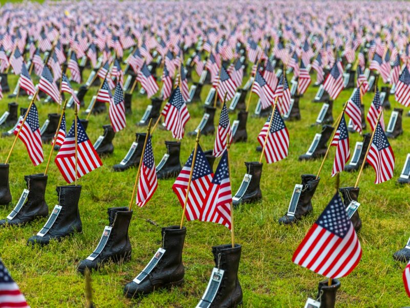 USA flag in black boots lot