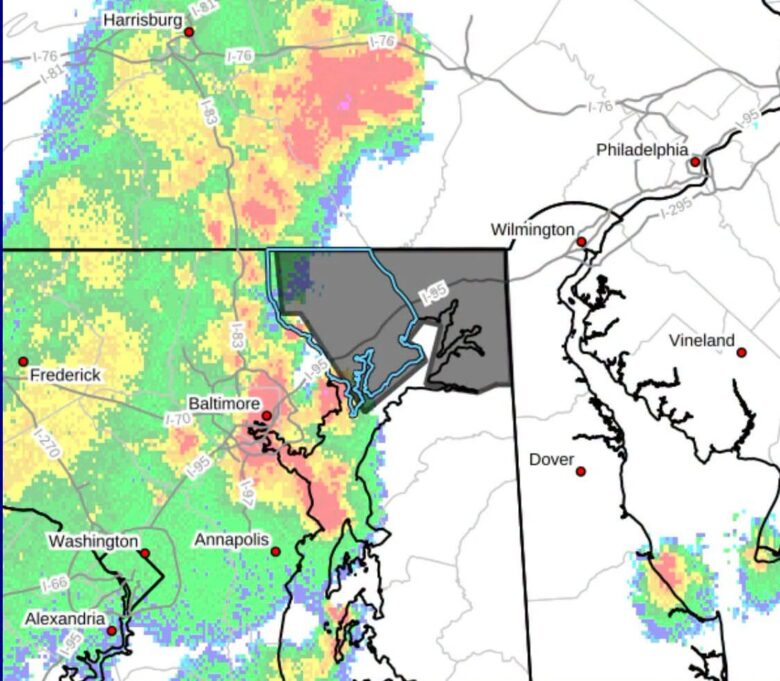 Weather radar map showing a colorful storm band across Maryland and Delaware with city labels and coastlines.