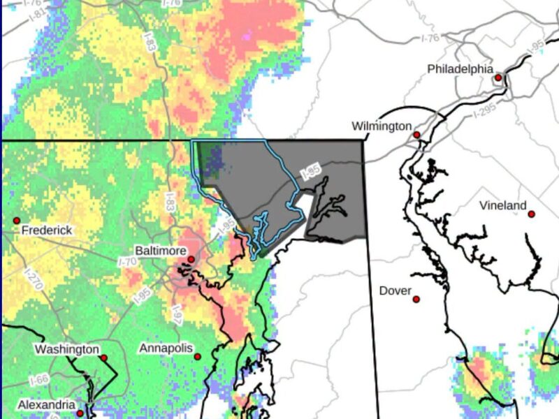 Weather radar map showing a colorful storm band across Maryland and Delaware with city labels and coastlines.
