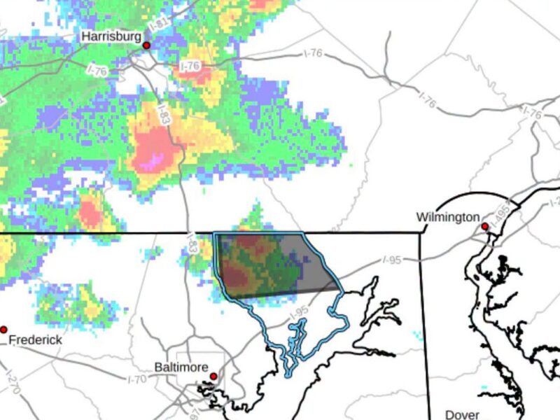 Weather radar map showing rain and storm cells over Maryland and Pennsylvania near Baltimore, Wilmington, and Harrisburg.